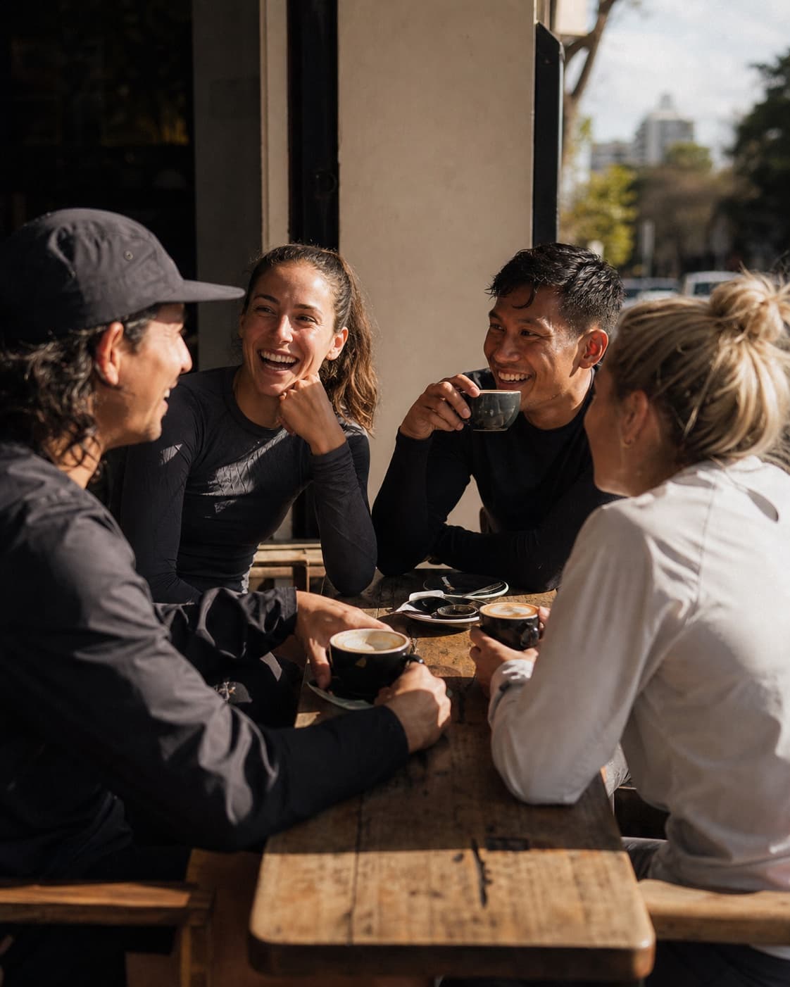 Runners talking over coffee after a run